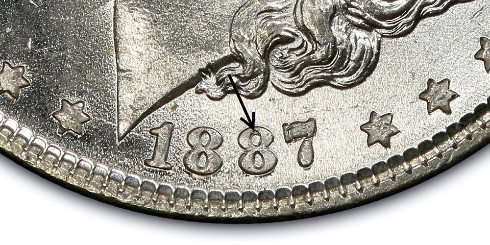 1887 Morgan dollar VAM-5 doubled date showing secondary date impression shifted rightward under magnification